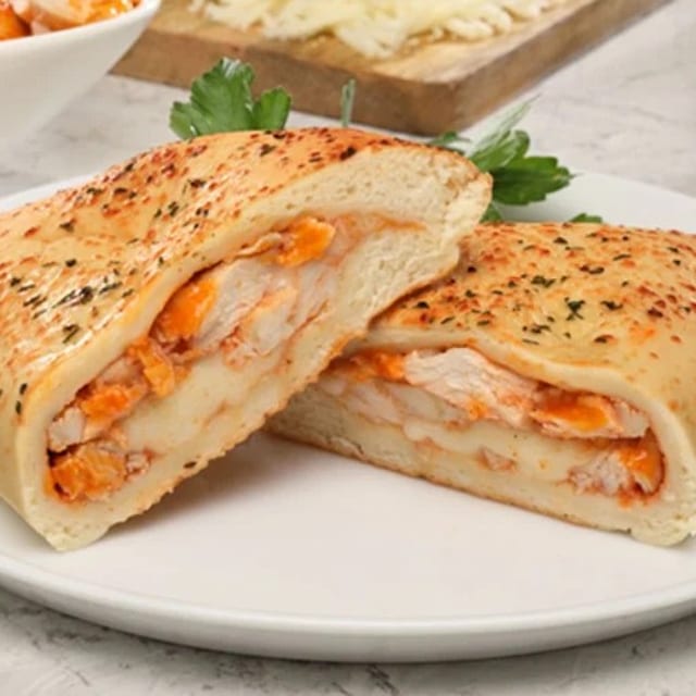 The Cheesy Trio Calzone.