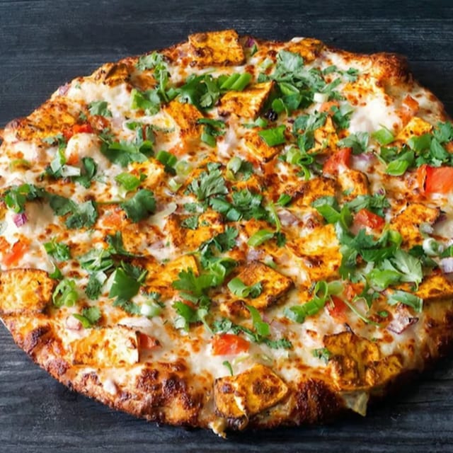Achari Chicken Pizza.